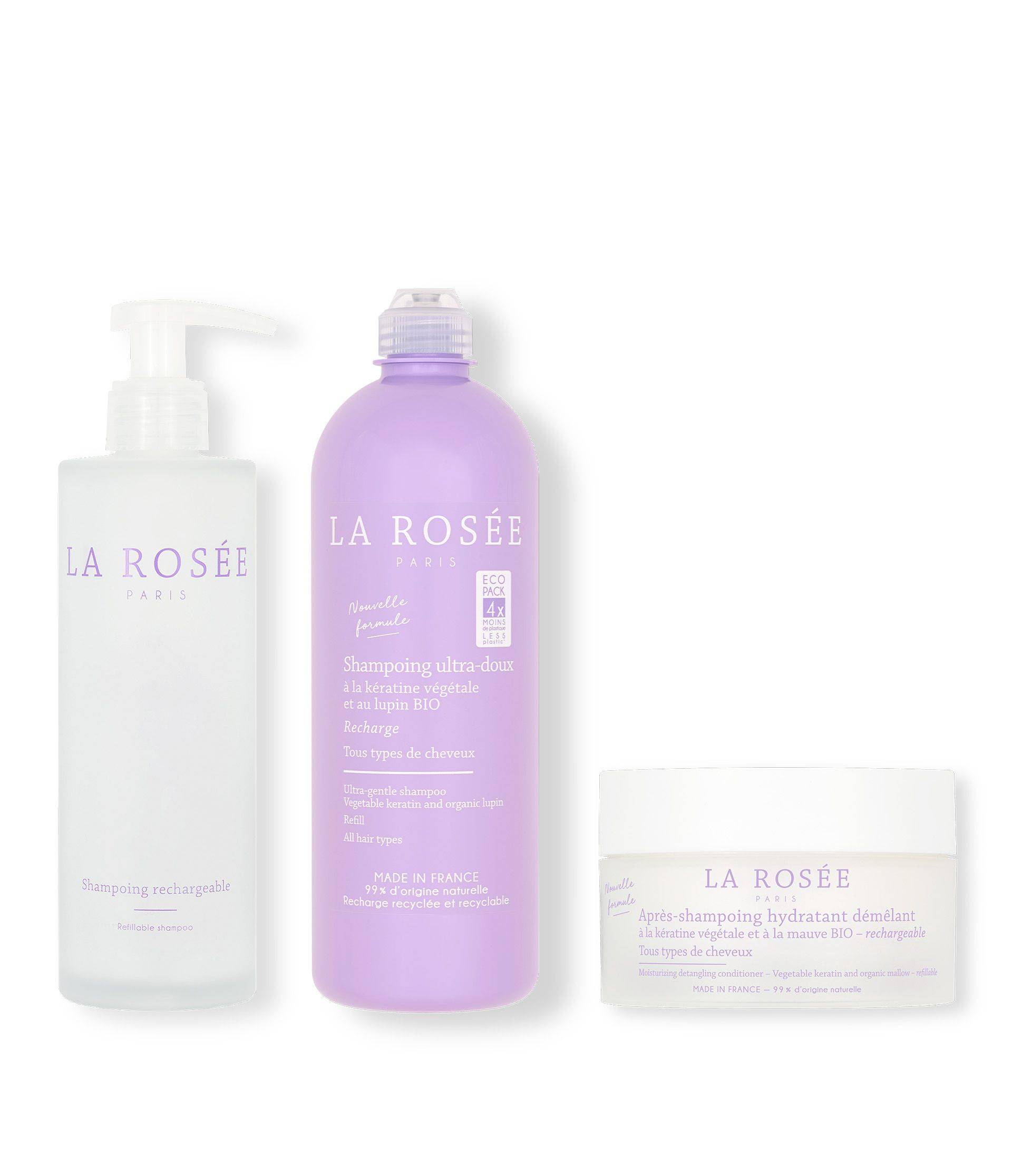 Three La Rosée Paris hair care products: a clear pump bottle, a purple shampoo bottle, and a white conditioning cream jar.